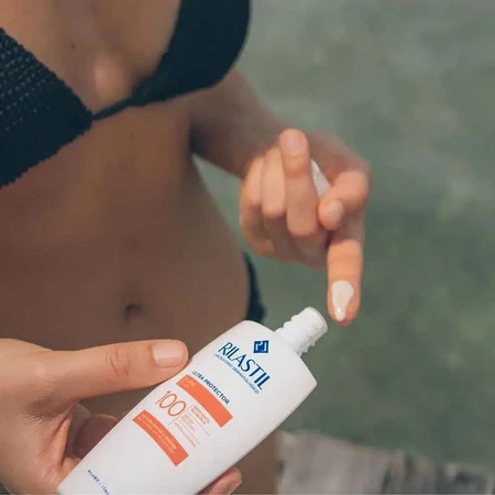 Ultra 100-Protector ochranný fluid na obličej a tělo s vysokými UV filtry